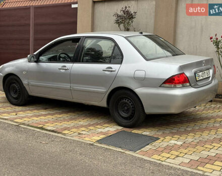 Сірий Міцубісі Lancer, об'ємом двигуна 1.6 л та пробігом 221 тис. км за 3650 $, фото 15 на Automoto.ua