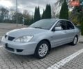 Серый Мицубиси Лансер, объемом двигателя 1.6 л и пробегом 225 тыс. км за 4450 $, фото 1 на Automoto.ua