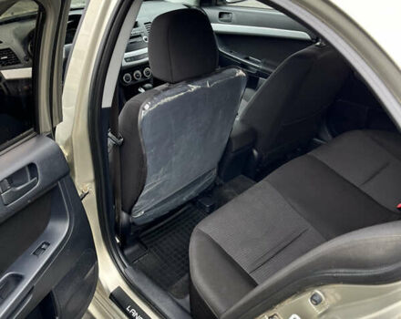 Сірий Міцубісі Lancer, об'ємом двигуна 2 л та пробігом 230 тис. км за 6800 $, фото 21 на Automoto.ua
