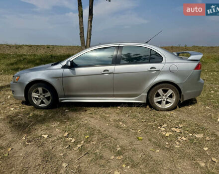 Сірий Міцубісі Lancer, об'ємом двигуна 2 л та пробігом 238 тис. км за 6000 $, фото 5 на Automoto.ua