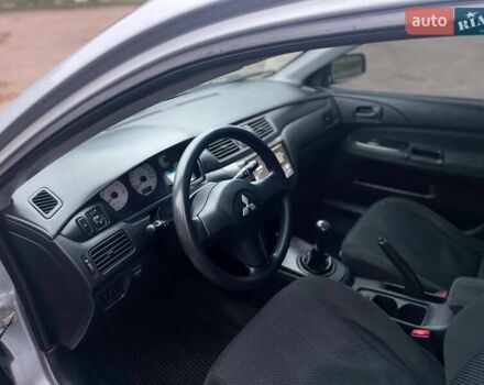 Сірий Міцубісі Lancer, об'ємом двигуна 1.6 л та пробігом 254 тис. км за 3800 $, фото 18 на Automoto.ua