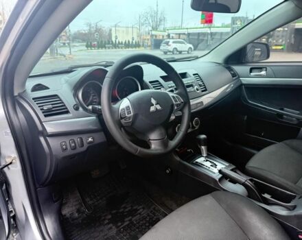 Серый Мицубиси Лансер, объемом двигателя 2 л и пробегом 210 тыс. км за 6500 $, фото 4 на Automoto.ua