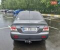 Сірий Міцубісі Lancer, об'ємом двигуна 1.58 л та пробігом 245 тис. км за 2650 $, фото 6 на Automoto.ua