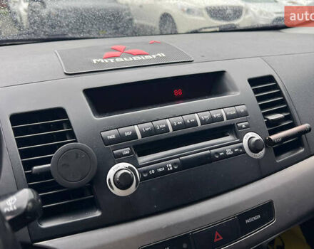 Серый Мицубиси Лансер, объемом двигателя 1.5 л и пробегом 239 тыс. км за 6000 $, фото 11 на Automoto.ua