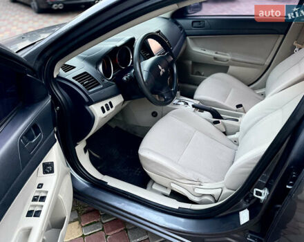 Серый Мицубиси Лансер, объемом двигателя 2 л и пробегом 212 тыс. км за 6000 $, фото 20 на Automoto.ua