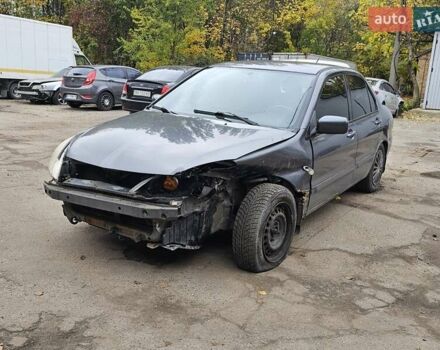 Сірий Міцубісі Lancer, об'ємом двигуна 1.58 л та пробігом 200 тис. км за 1700 $, фото 2 на Automoto.ua