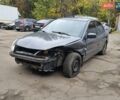 Сірий Міцубісі Lancer, об'ємом двигуна 1.58 л та пробігом 200 тис. км за 1700 $, фото 2 на Automoto.ua