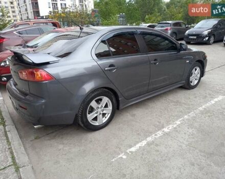 Серый Мицубиси Лансер, объемом двигателя 2 л и пробегом 99 тыс. км за 7800 $, фото 2 на Automoto.ua