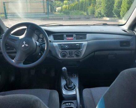 Серый Мицубиси Лансер, объемом двигателя 1.6 л и пробегом 117 тыс. км за 3980 $, фото 5 на Automoto.ua
