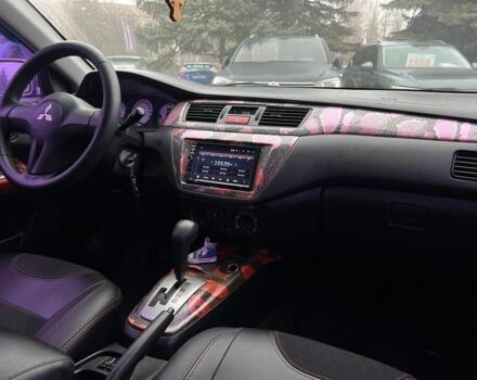 Серый Мицубиси Лансер, объемом двигателя 1.6 л и пробегом 205 тыс. км за 5400 $, фото 12 на Automoto.ua