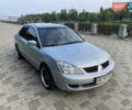 Сірий Міцубісі Lancer, об'ємом двигуна 1.6 л та пробігом 100 тис. км за 7300 $, фото 1 на Automoto.ua