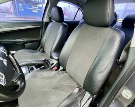 Серый Мицубиси Лансер, объемом двигателя 2 л и пробегом 203 тыс. км за 4999 $, фото 9 на Automoto.ua