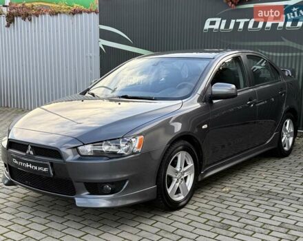 Серый Мицубиси Лансер, объемом двигателя 2 л и пробегом 230 тыс. км за 6900 $, фото 6 на Automoto.ua