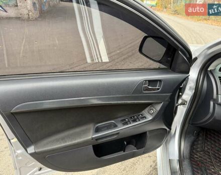 Сірий Міцубісі Lancer, об'ємом двигуна 2 л та пробігом 253 тис. км за 8700 $, фото 27 на Automoto.ua