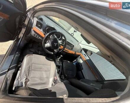 Серый Мицубиси Лансер, объемом двигателя 1.5 л и пробегом 224 тыс. км за 6300 $, фото 3 на Automoto.ua