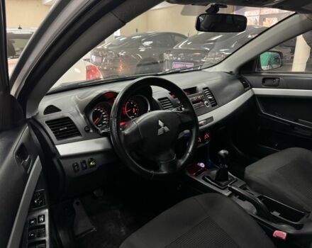 Серый Мицубиси Лансер, объемом двигателя 1.5 л и пробегом 241 тыс. км за 6400 $, фото 9 на Automoto.ua