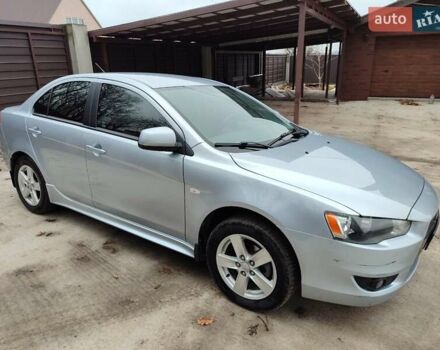 Серый Мицубиси Лансер, объемом двигателя 2 л и пробегом 234 тыс. км за 7200 $, фото 8 на Automoto.ua