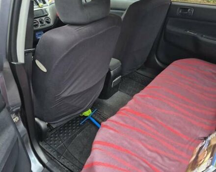 Сірий Міцубісі Lancer, об'ємом двигуна 1.6 л та пробігом 230 тис. км за 4400 $, фото 7 на Automoto.ua