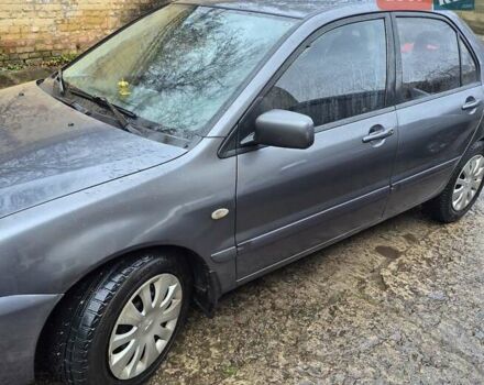 Сірий Міцубісі Lancer, об'ємом двигуна 1.6 л та пробігом 230 тис. км за 4400 $, фото 1 на Automoto.ua