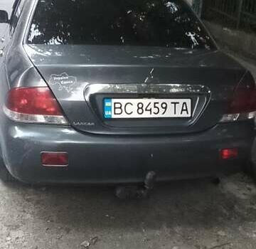 Сірий Міцубісі Lancer, об'ємом двигуна 1.58 л та пробігом 323 тис. км за 3300 $, фото 5 на Automoto.ua