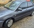 Сірий Міцубісі Lancer, об'ємом двигуна 1.6 л та пробігом 230 тис. км за 4400 $, фото 1 на Automoto.ua