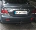 Сірий Міцубісі Lancer, об'ємом двигуна 1.58 л та пробігом 323 тис. км за 3300 $, фото 5 на Automoto.ua
