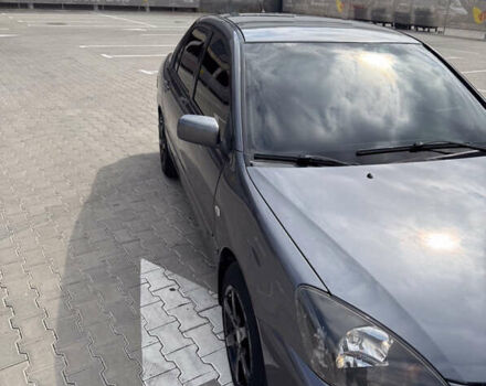 Серый Мицубиси Лансер, объемом двигателя 1.58 л и пробегом 250 тыс. км за 4300 $, фото 2 на Automoto.ua