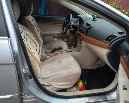 Сірий Міцубісі Lancer, об'ємом двигуна 2 л та пробігом 180 тис. км за 6400 $, фото 6 на Automoto.ua