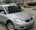 Сірий Міцубісі Lancer, об'ємом двигуна 1.6 л та пробігом 269 тис. км за 3999 $, фото 3 на Automoto.ua