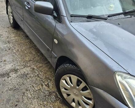 Сірий Міцубісі Lancer, об'ємом двигуна 1.6 л та пробігом 230 тис. км за 4400 $, фото 5 на Automoto.ua