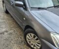Сірий Міцубісі Lancer, об'ємом двигуна 1.6 л та пробігом 230 тис. км за 4400 $, фото 5 на Automoto.ua