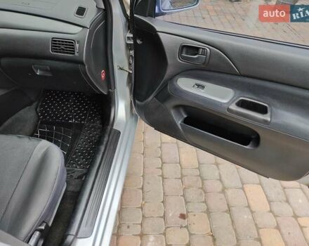 Серый Мицубиси Лансер, объемом двигателя 1.58 л и пробегом 185 тыс. км за 4700 $, фото 11 на Automoto.ua