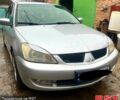 Сірий Міцубісі Lancer, об'ємом двигуна 1.6 л та пробігом 282 тис. км за 4699 $, фото 1 на Automoto.ua