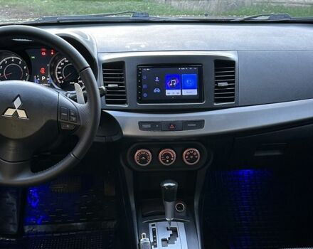 Серый Мицубиси Лансер, объемом двигателя 2 л и пробегом 153 тыс. км за 7500 $, фото 3 на Automoto.ua