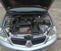 Сірий Міцубісі Lancer, об'ємом двигуна 1.6 л та пробігом 176 тис. км за 4999 $, фото 31 на Automoto.ua