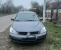 Сірий Міцубісі Lancer, об'ємом двигуна 1.58 л та пробігом 186 тис. км за 3500 $, фото 2 на Automoto.ua