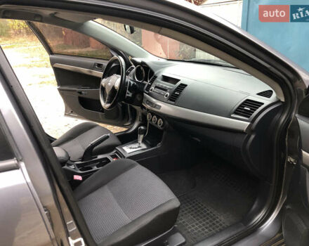 Сірий Міцубісі Lancer, об'ємом двигуна 2 л та пробігом 187 тис. км за 8000 $, фото 25 на Automoto.ua
