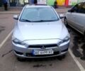 Серый Мицубиси Лансер, объемом двигателя 2 л и пробегом 312 тыс. км за 5500 $, фото 1 на Automoto.ua