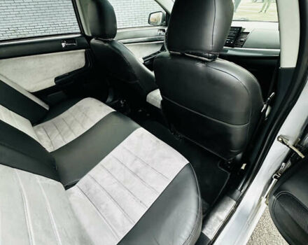 Сірий Міцубісі Lancer, об'ємом двигуна 2 л та пробігом 238 тис. км за 5350 $, фото 17 на Automoto.ua