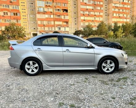 Серый Мицубиси Лансер, объемом двигателя 2 л и пробегом 223 тыс. км за 6890 $, фото 6 на Automoto.ua