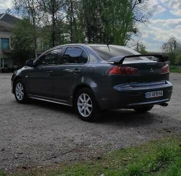 Сірий Міцубісі Lancer, об'ємом двигуна 2 л та пробігом 153 тис. км за 7700 $, фото 3 на Automoto.ua