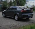 Сірий Міцубісі Lancer, об'ємом двигуна 2 л та пробігом 153 тис. км за 7700 $, фото 3 на Automoto.ua