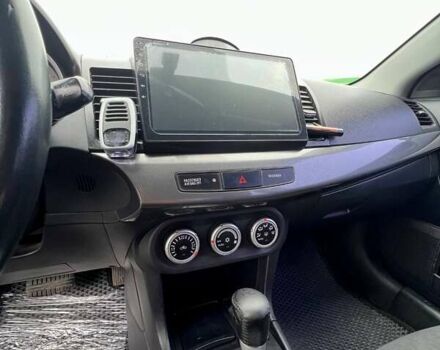 Серый Мицубиси Лансер, объемом двигателя 2 л и пробегом 203 тыс. км за 4999 $, фото 16 на Automoto.ua