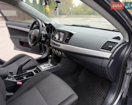 Мицубиси Лансер 2008 в Днепре (Днепропетровске) на Automoto.ua Серый Мицубиси Лансер, объемом двигателя 2 л и пробегом 152 тыс. км за 7999 $, фото 33 на Automoto.ua
