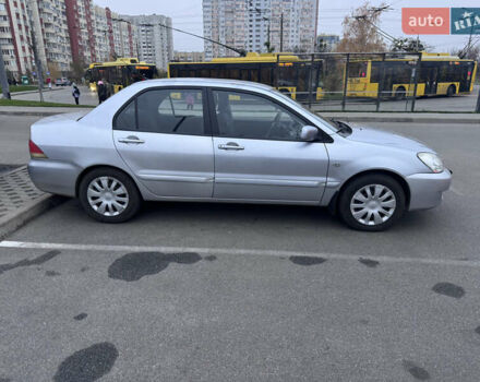 Серый Мицубиси Лансер, объемом двигателя 1.58 л и пробегом 330 тыс. км за 3500 $, фото 20 на Automoto.ua