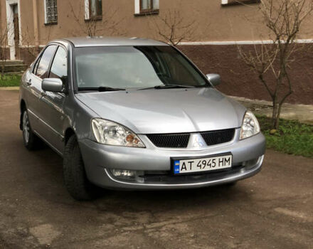 Сірий Міцубісі Lancer, об'ємом двигуна 1.6 л та пробігом 225 тис. км за 4100 $, фото 1 на Automoto.ua