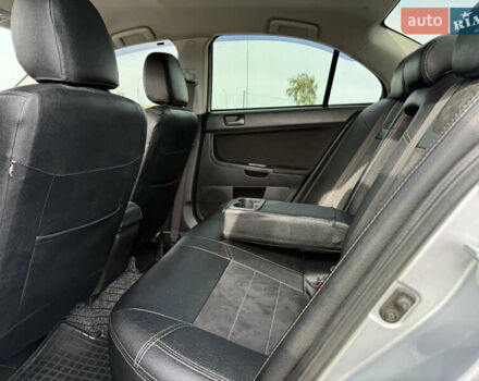 Серый Мицубиси Лансер, объемом двигателя 2 л и пробегом 175 тыс. км за 7300 $, фото 7 на Automoto.ua