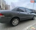Сірий Міцубісі Lancer, об'ємом двигуна 1.6 л та пробігом 250 тис. км за 3500 $, фото 6 на Automoto.ua