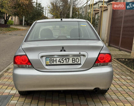 Сірий Міцубісі Lancer, об'ємом двигуна 1.6 л та пробігом 221 тис. км за 3650 $, фото 13 на Automoto.ua