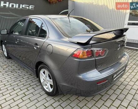 Серый Мицубиси Лансер, объемом двигателя 2 л и пробегом 230 тыс. км за 6900 $, фото 23 на Automoto.ua